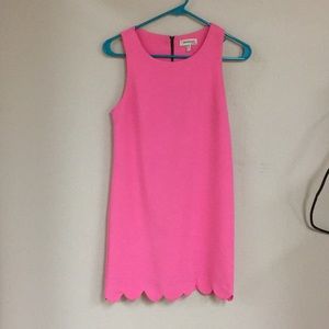 Bright pink dress with scalloped bottom